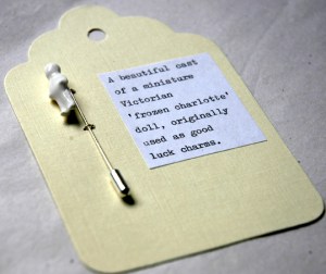 Bone china and sterling silver frozen charlotte pin